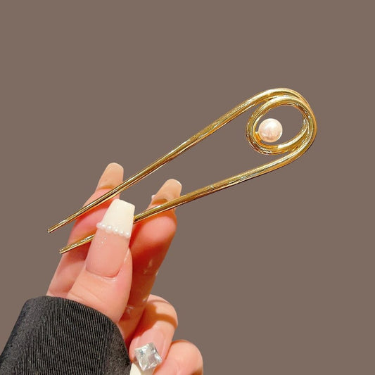 Pinza francesa con perla