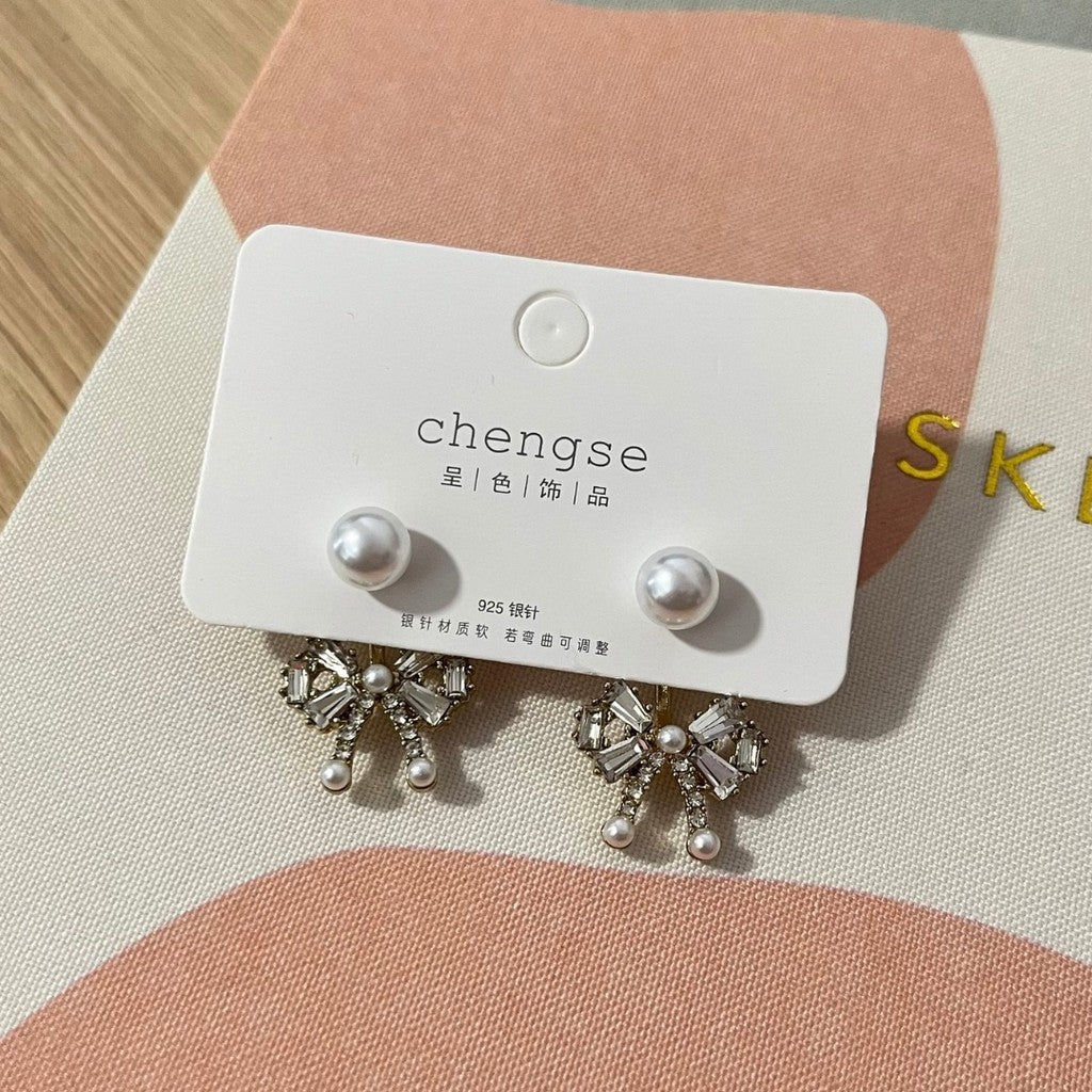 Aretes de moño atrás