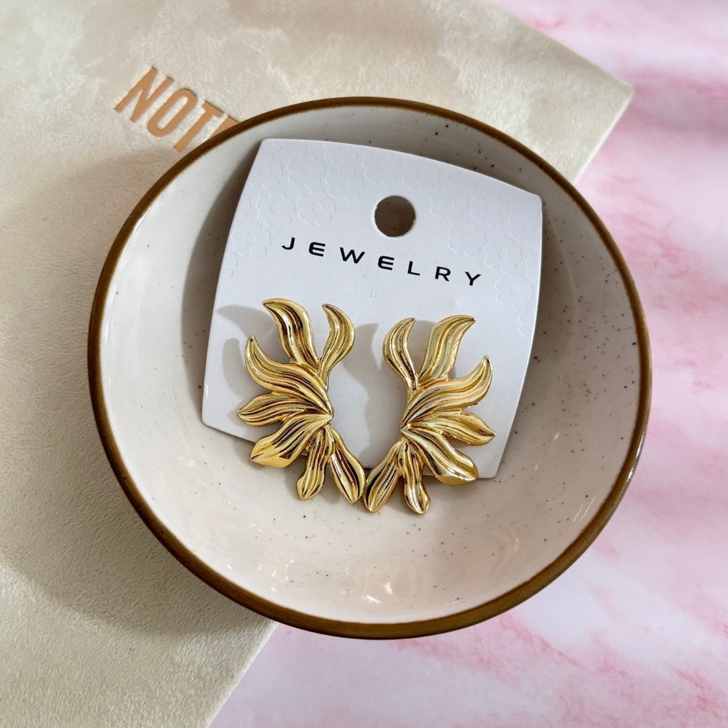 Aretes en llamas