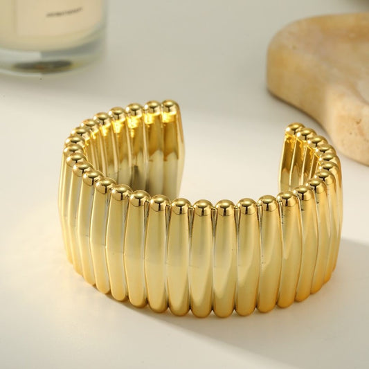 Pulsera dorada franjas
