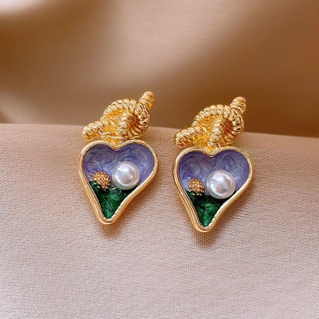 Aretes de corazon morado