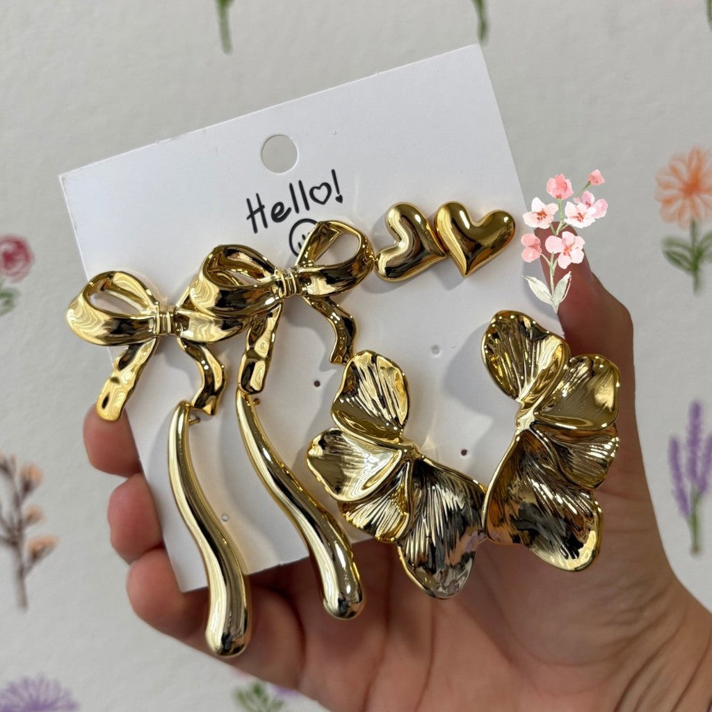 Set de aretes moño largo