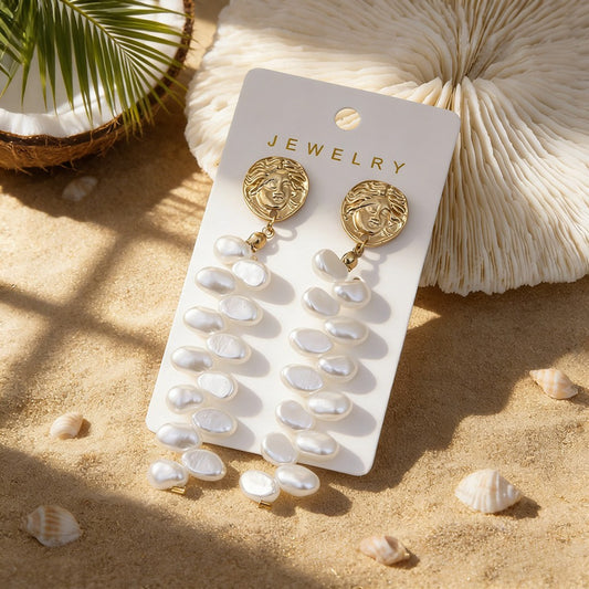 Aretes largos lluvia de perlitas blancas